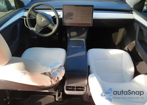 2023 Tesla Model Y z USA, uszkodzony, nr VIN 7SAYGAEE0PF942010